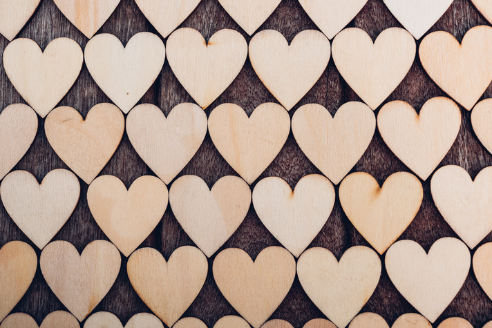 Wood Heart Pattern on Wooden Background,